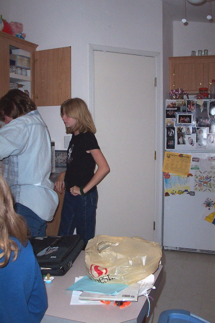 Birthday girl looks on