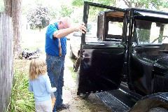 Hannah rides in Grandpa's "T"
