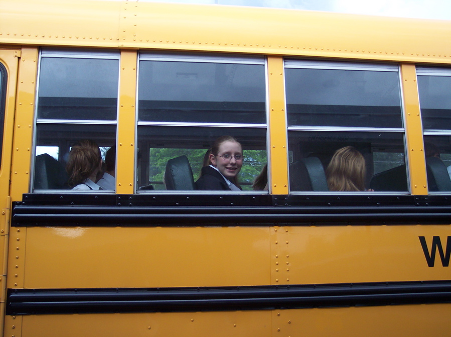 Heather on the bus to large group contest